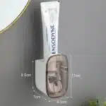 Distributeur de dentifrice murale a pression